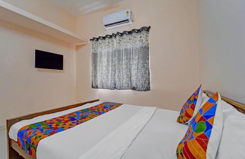 Tirupur Hotel | FabExpress Praneeth Residency