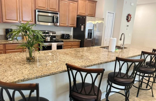 Campbell House | Family 4-BR Villa w/Private Pool in Storey Lake, Near Disney!