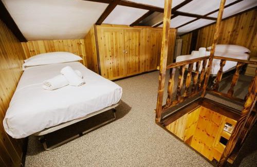 Sauze d'Oulx Apartment | Family relaxation 2 minutes from the slopes - Parking & WiFi