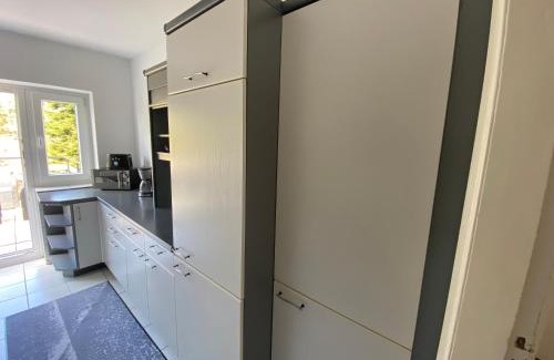 Flensburg Apartment | Ferienwohnung mit Balkon und Garten OG