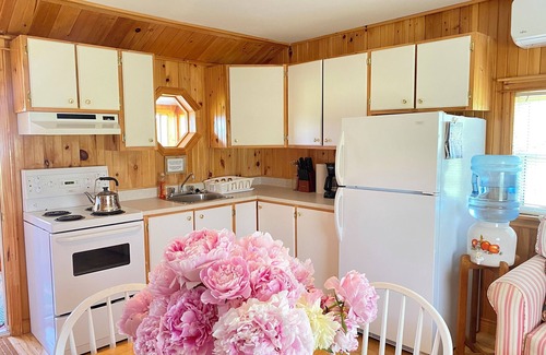Saint Peters Bay Cottage | Fiddlehead Cottage on the Bay. Water view, bayside gazebo, trail access, beaches