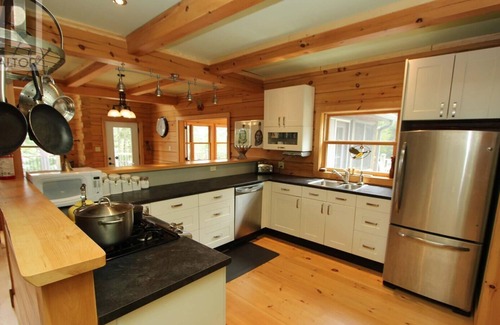 Marmora and Lake Cottage | Firefly Lodge - remote BOAT-ACCESS waterfront log home