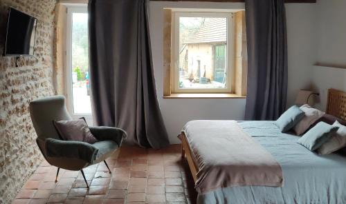 Ouroux-sous-le-Bois-Sainte-Marie Bed & Breakfast | La Coquille, chambre douillette auprès d'un élevage d'escargots