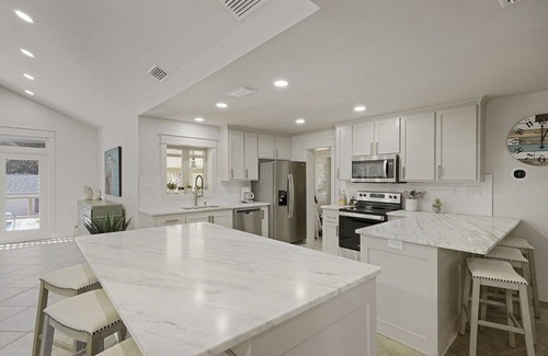 Gulf Pines House | Fun in the Sun - Vacation Home with Private Pool, Pickleball Court & Includes Golf Cart