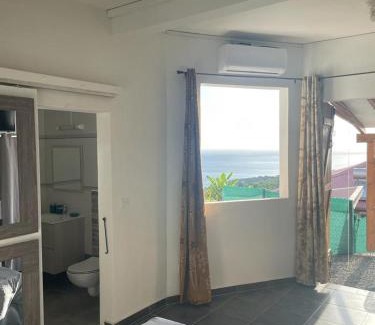 Vieux-Habitants Apartment | Gîte cosy vue mer