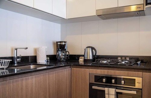 Petit Jean Ocharan Apartment | geko Sahara Sunset 2BR