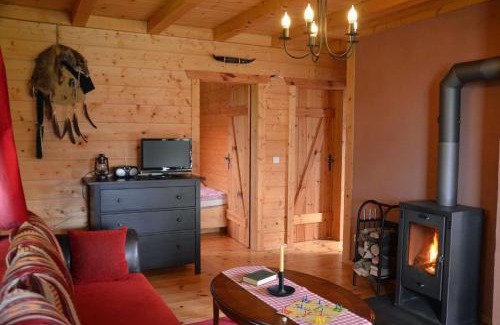 Saal House | Gemütliches Holzhaus auf einer Ferienanlage im Western-Style