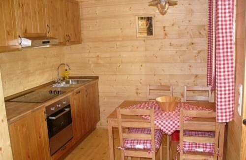 Saal House | Gemütliches Holzhaus auf einer Ferienanlage im Western-Style