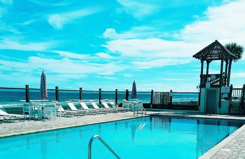 Bostwick Park Condo | Get lost in your DREAM VACATION in this modern beach condo
