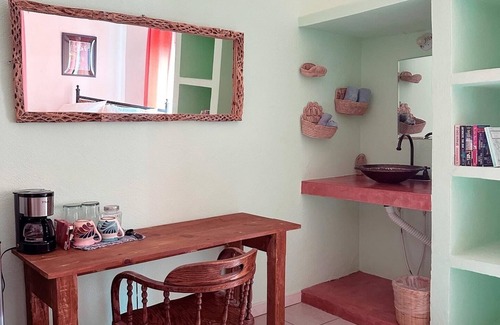San Bartolo Villa | Glamping orchard and suites with large stone kitchen and pool in Baja Sur.