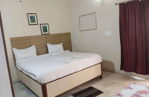 Khajuraho Hotel | Goroomgo Happy Homestay Khajuraho