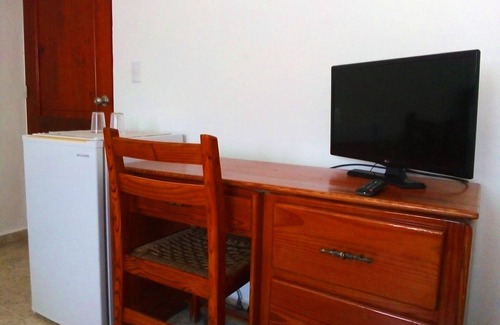 El Batey Apartment | Guest-friendly room in central Sosua, pool/Wifi/cable TV, near everything