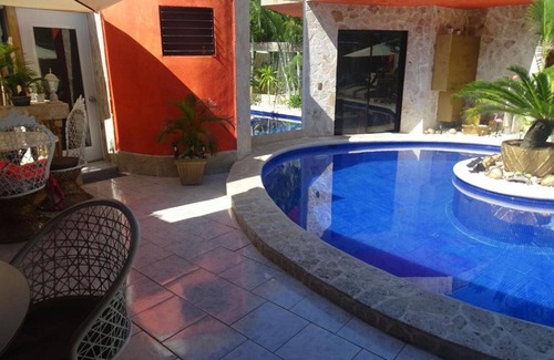 Playa Chiquita Apartment | Guest-friendly suite with jacuzzi, love swing, mirrors, perfect for single men!