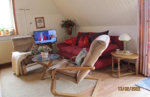 Stinteck Apartment | Haus mit Lilie und Rose