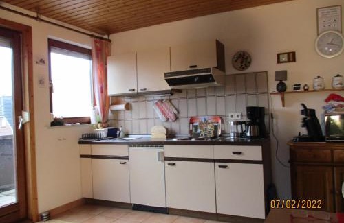 Stinteck Apartment | Haus mit Lilie und Rose