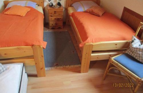 Stinteck Apartment | Haus mit Lilie und Rose