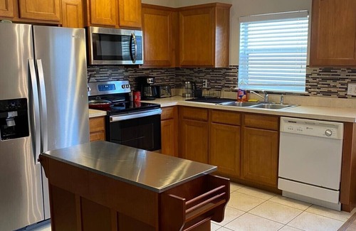 Sandy Ridge House | Heated Pool, Grill 4Bdr/3Bath Home close to Disney