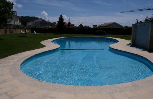 Esposende Villa | high standard rental in a quality residence with pool, tennis and view of the ocean in antas esposende 12 people