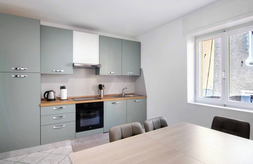 Dongo Apartment | Holiday Apartment "Dongo Garden" with Private Garden & Wi-Fi