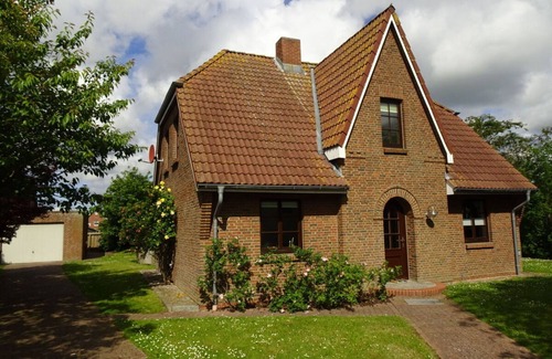 Midlum Apartment | Holiday home gray seal