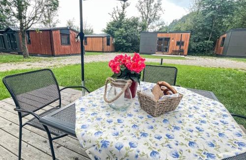 Riedenburg House | Holiday Home Tiny Haus Sunside Gardenlounge by Interhome