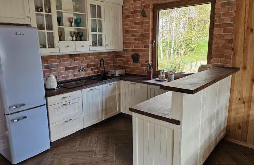Szczecinek House | Holiday homes with a private beach on the lake