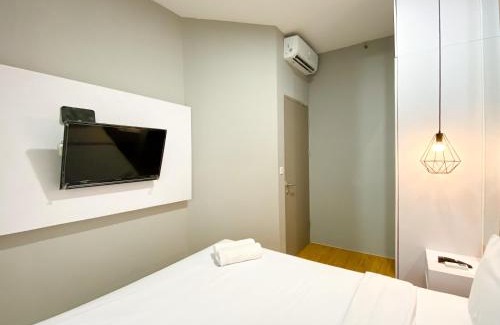 Cikarang Apartment | Homey and Minimalist 1BR Vasanta Innopark Apartment By Travelio