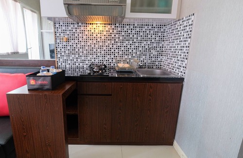 Rawasari Apartment | Homey and Relaxing 2BR Green Pramuka Apartment