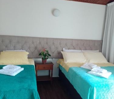 Jardim Andira Hotel | Hospedagem Virginia Bracelli