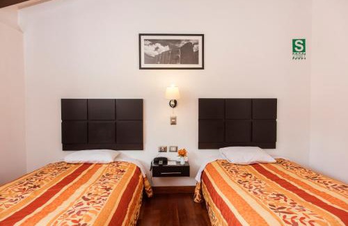 Cusco Historic Center Hotel | Hostal & Apartments El Triunfo