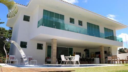 Parafuso House | House 6 Suites 80 Meters from the Beach in Guarajuba