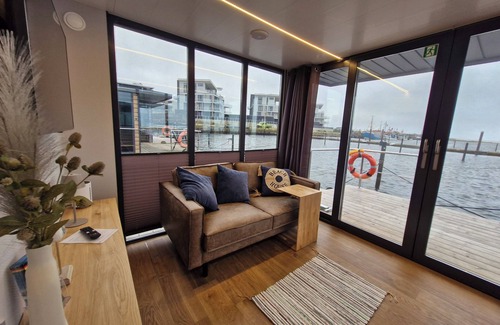 Wendtorf Boat Rental | Houseboat Fjord Cumulus with bio sauna and roof terrace in Wendtorf/Kiel Fjord