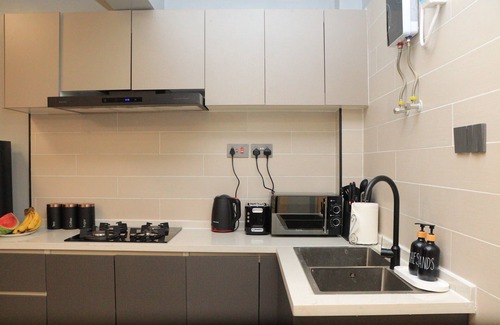 Thompson Estate Apartment | Hughesy Haven.nCozy apartment in Nairobi with WiFi, fitness room and pool