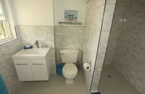 Kittian Village Condo | HUMMINGBIRD VIEW LARGE ONE BED CONDO SLEEPS 3 OVBERLOOKING THE OCEAN AND GARDENS