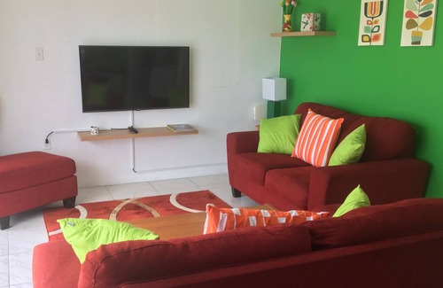 Kittian Village Condo | HUMMINGBIRD VIEW LARGE ONE BED CONDO SLEEPS 3 OVBERLOOKING THE OCEAN AND GARDENS