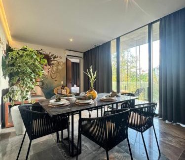 Tulum City Center Apartment | IIK Tulum by Groovy Stays- A Hip Condo-Hotel with WIFI, Rooftop, Pool, Sleeps 6