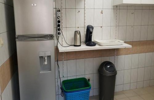 Lome Apartment | iléos, appartement meublé 4 pièces - Salon, cuisine, 3 chambres Lomé Tokoin Hôpital Protestant