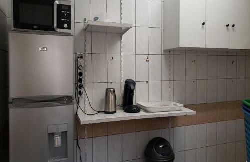 Lome Apartment | iléos, appartement meublé 4 pièces - Salon, cuisine, 3 chambres Lomé Tokoin Hôpital Protestant