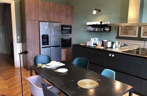 L'Europe Apartment | Impressive duplex, trees view on square opposite, sunny, right in the Paris center and fashionable districts. Luxury Apartment