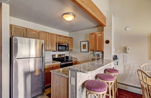 Historic District Condo | In The Heart Of Breck - Studio With Loft 1 Bedroom Condo by RedAwning