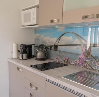 Landkirchen House | Inselblume 66 - Kuschlige Ferienwohnung für 2 in Landkirchen