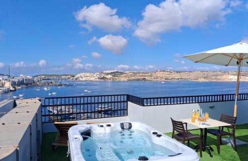 Bugibba Apartment | Islet Promenade Studio with Hot Tub and Panoramic Sea Views by GetawaysMalta