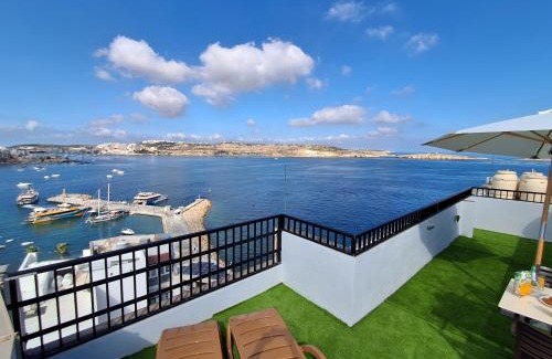 Bugibba Apartment | Islet Promenade Studio with Hot Tub and Panoramic Sea Views by GetawaysMalta