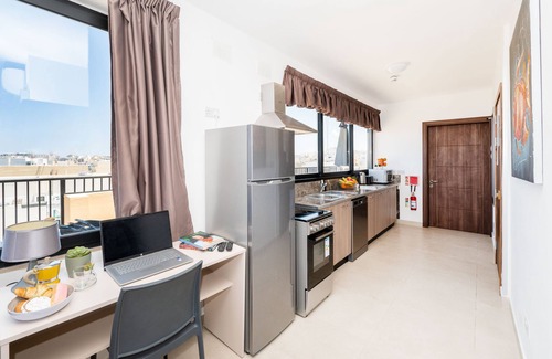 Bugibba Apartment | Islet Seafront Penthouse with Hot tub
