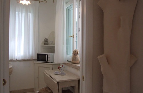 Marina di Castagneto Carducci Apartment | Lovely apartment for 4 guests with A/C, WIFI, TV, patio and panoramic view