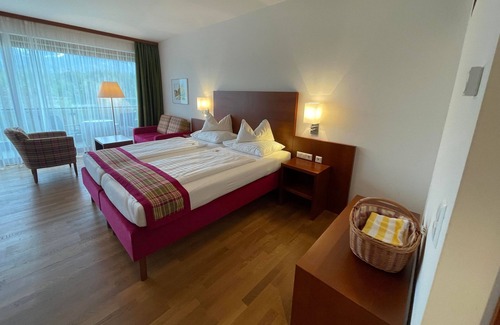 Drobollach am Faakersee House | Junior Suite Faaker See - Seehotel Ressmann
