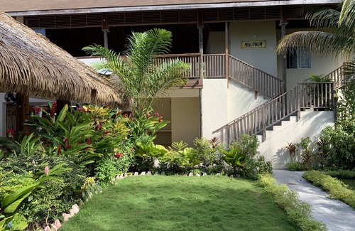Negril Villa | King Suite at Oceanview Resort in Jamaica - Enjoy 7 Miles Of White Sand Beach! 1 Bedroom Villa by RedAwning