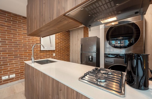 Laureles Apartment | Kyux Studios by MOME