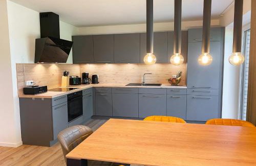 Tossens Apartment | Lütte Koje - strandnah mit Sauna.Besonders familienfreundlich.