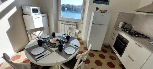 Le Grazie House | La Terrazza sulla baia di Le Grazie